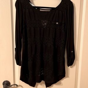 Oversized black blouse.